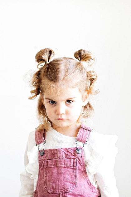 Individual portrait of one twin