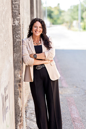 Natural professional headshot of a real estate agent in McKinney TX